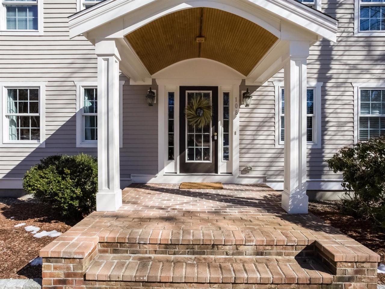 108 Fells Pond Road Mashpee, MA 02649 - Photo 4 of 35 a front view of a house with garden