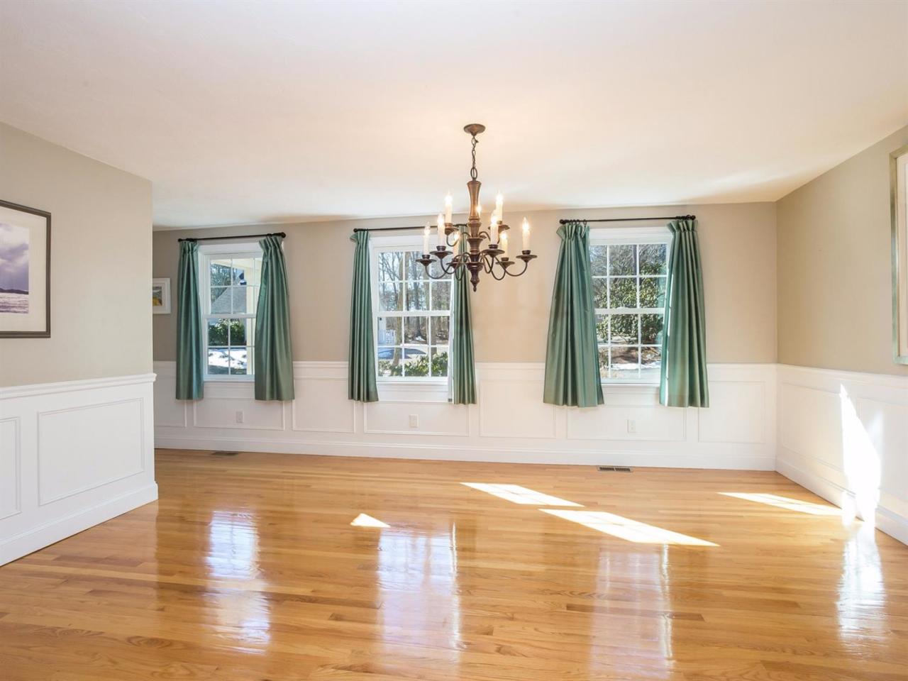 108 Fells Pond Road Mashpee, MA 02649 - Photo 7 of 35 a view of an empty room with window and wooden floor