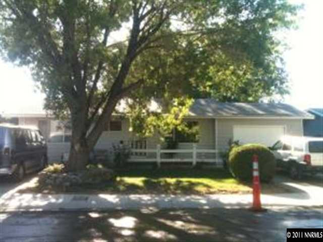 1070 Goldfield Street Reno, NV 89512 - Photo 1 of 1 a front view of a house with a yard