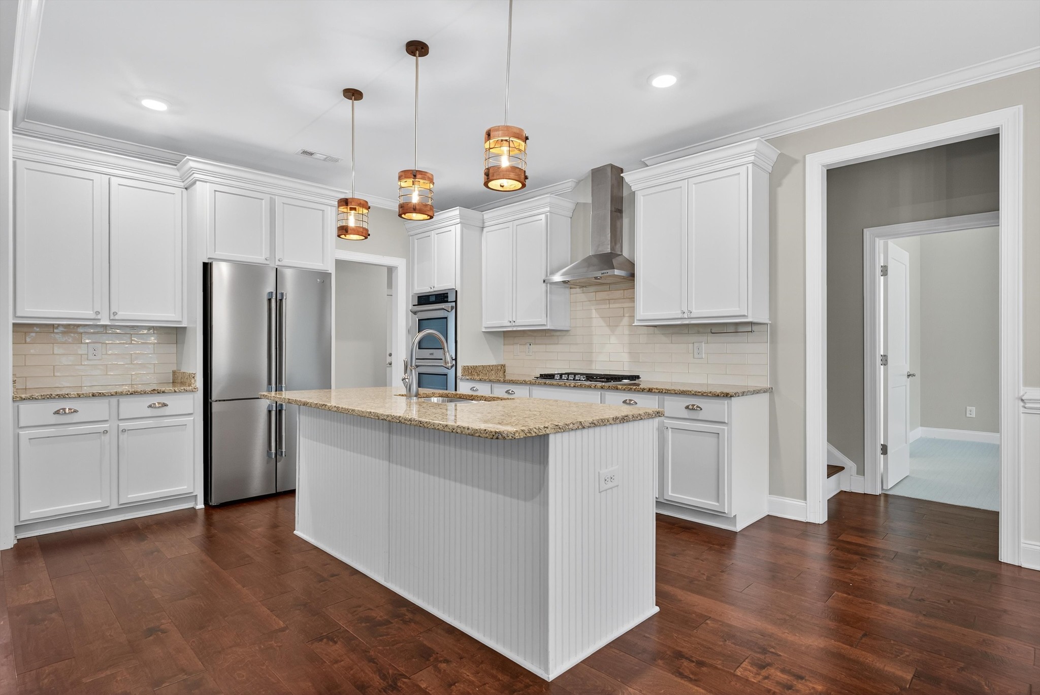 7401 Swindon Boulevard Fairview, TN 37062 - Photo 20 of 57 a kitchen with granite countertop stainless steel appliances a sink and a refrigerator
