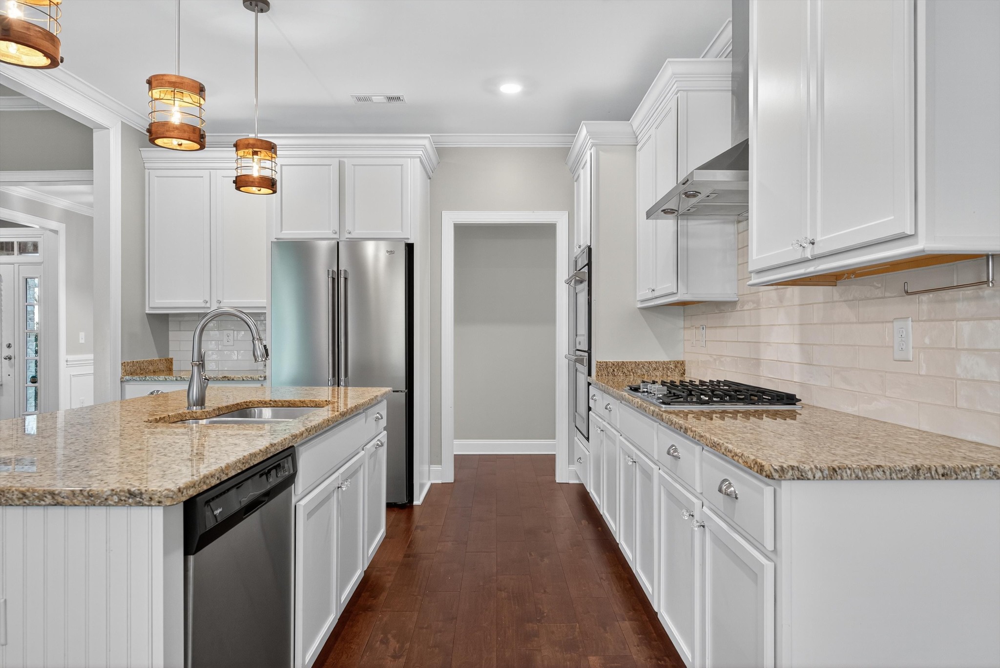 7401 Swindon Boulevard Fairview, TN 37062 - Photo 21 of 57 a kitchen with stainless steel appliances granite countertop a sink stove and refrigerator