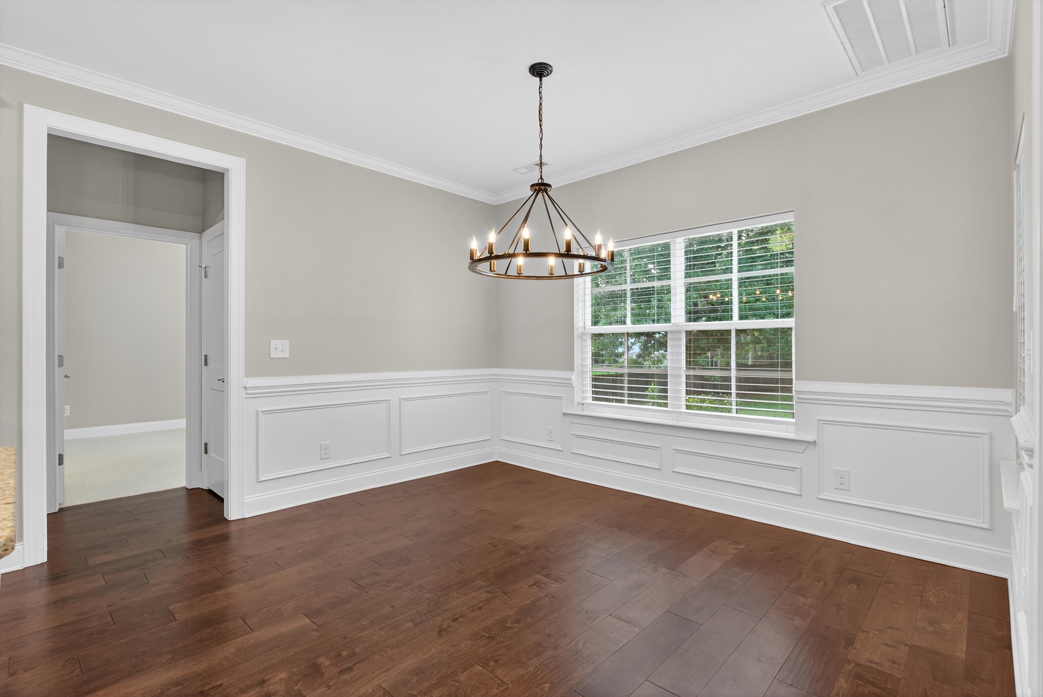 7401 Swindon Boulevard Fairview, TN 37062 - Photo 25 of 57 an empty room with wooden floor and windows