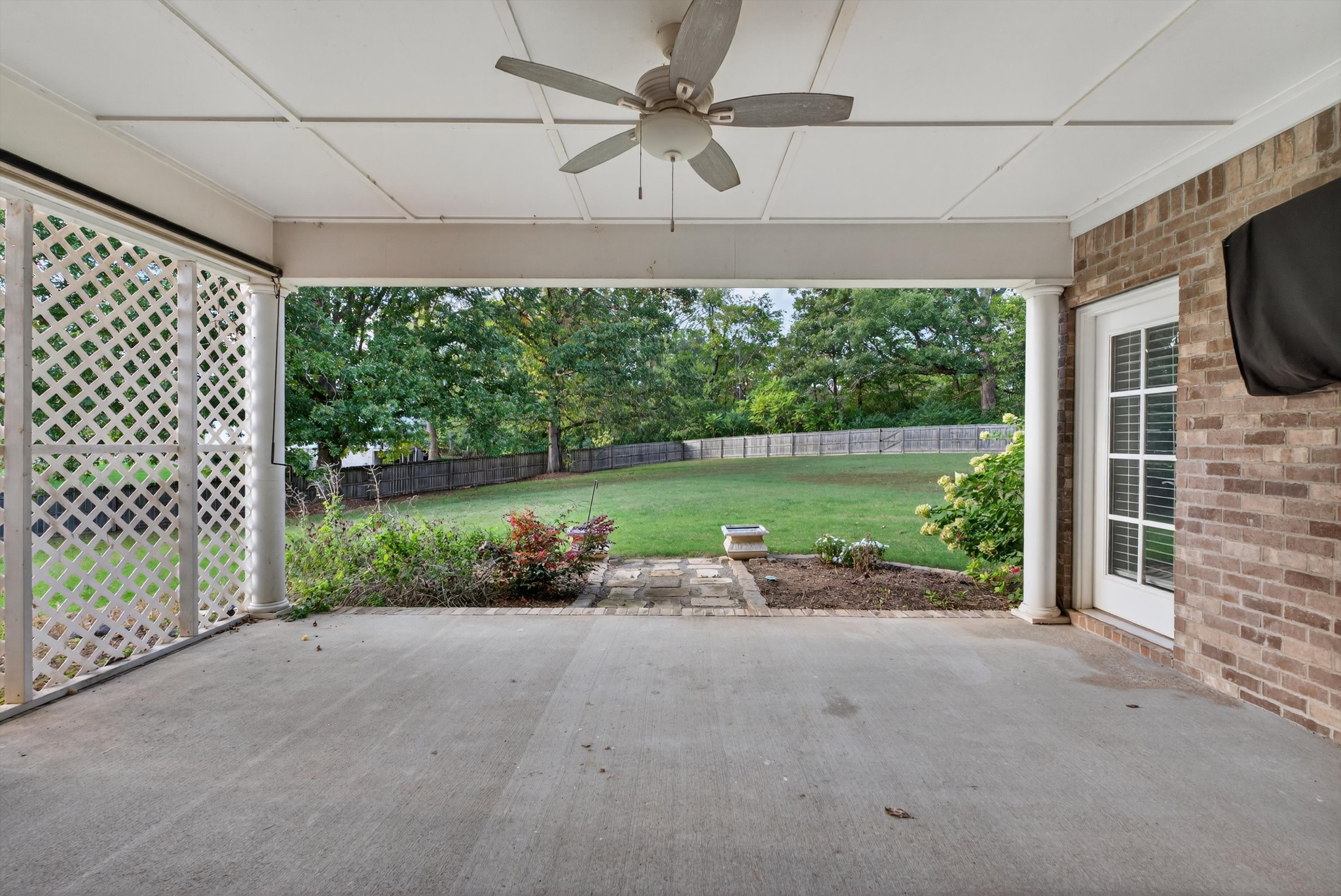 7401 Swindon Boulevard Fairview, TN 37062 - Photo 26 of 57 a view of a porch with furniture and garden