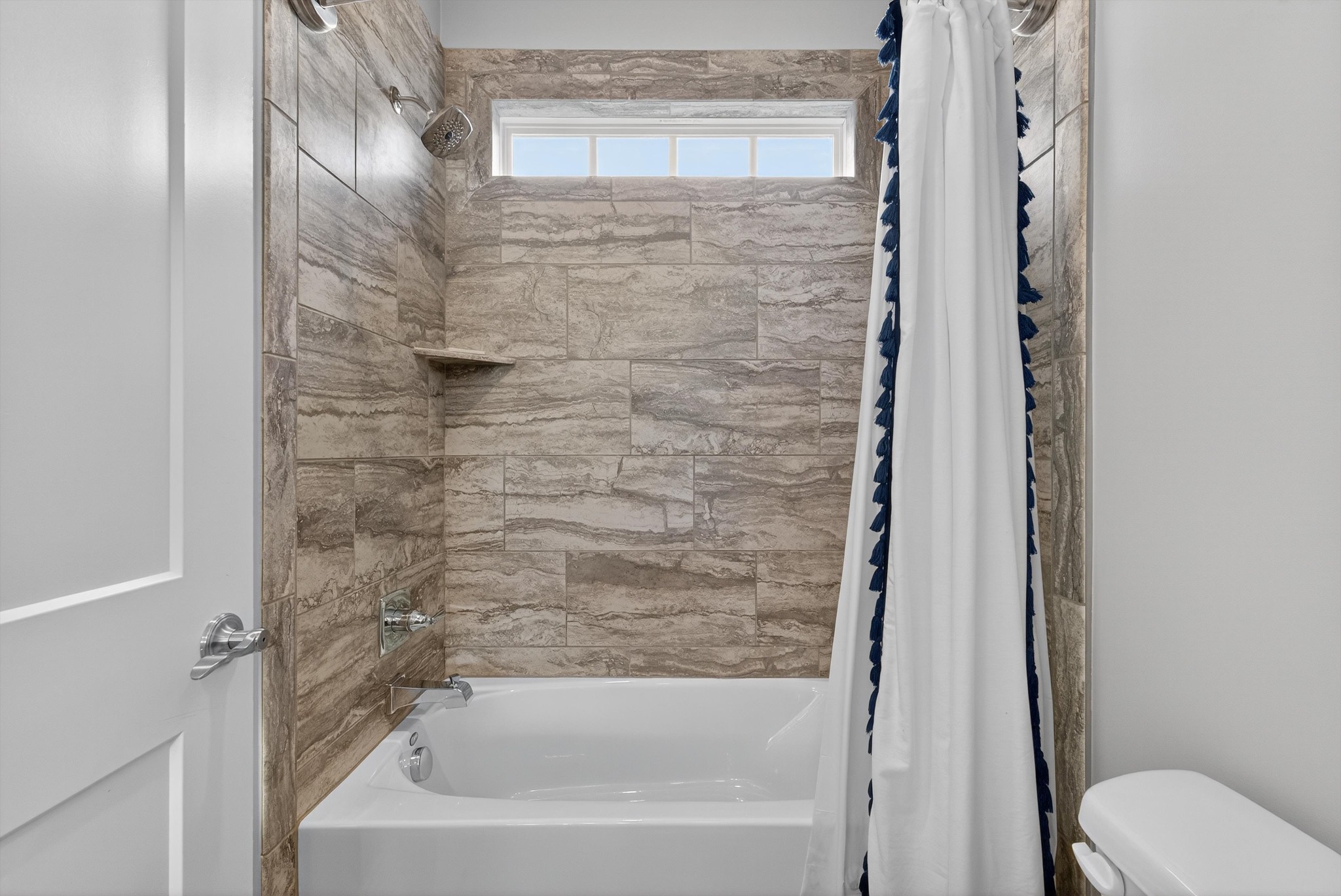 7401 Swindon Boulevard Fairview, TN 37062 - Photo 38 of 57 a bathroom with a bathtub and a shower