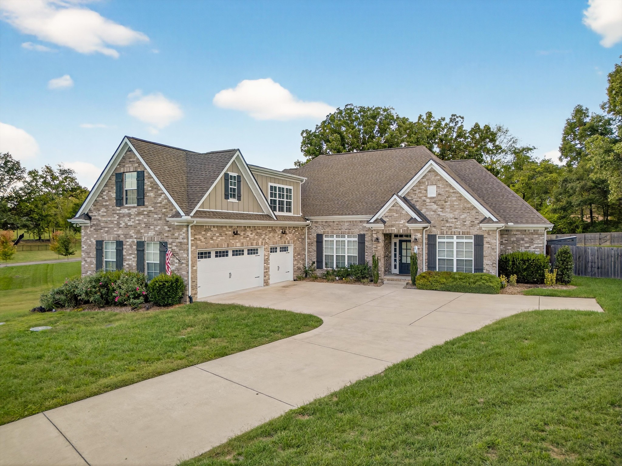 7401 Swindon Boulevard Fairview, TN 37062 - Photo 4 of 57 a front view of house with yard and green space