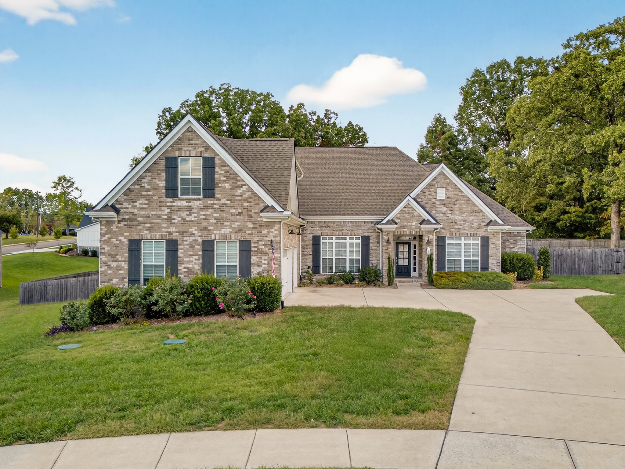 7401 Swindon Boulevard Fairview, TN 37062 - Photo 5 of 57 a front view of house with yard and green space