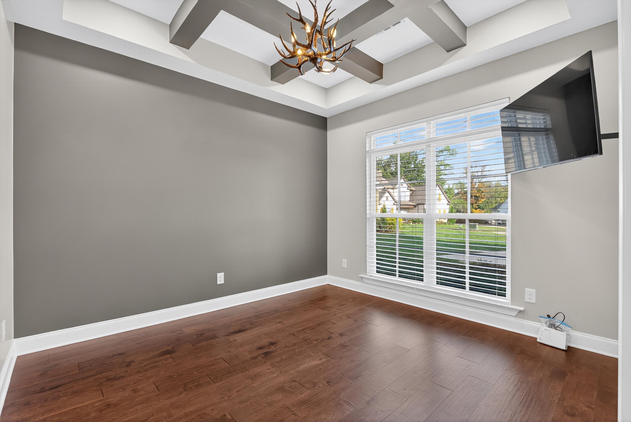 7401 Swindon Boulevard Fairview, TN 37062 - Photo 8 of 57 an empty room with wooden floor and windows