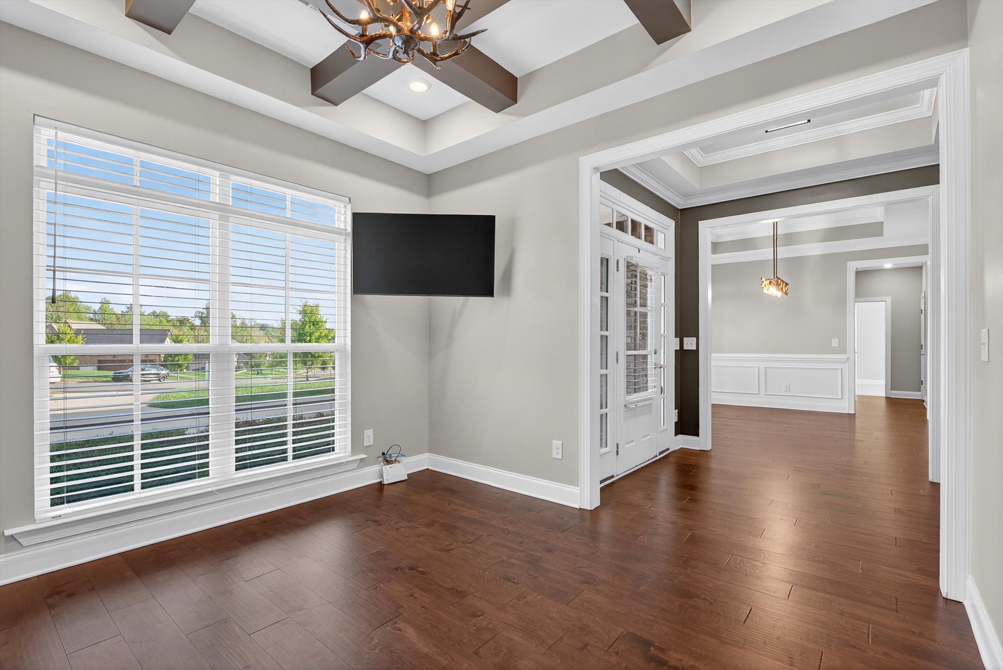 7401 Swindon Boulevard Fairview, TN 37062 - Photo 9 of 57 a view of an empty room with wooden floor and a window