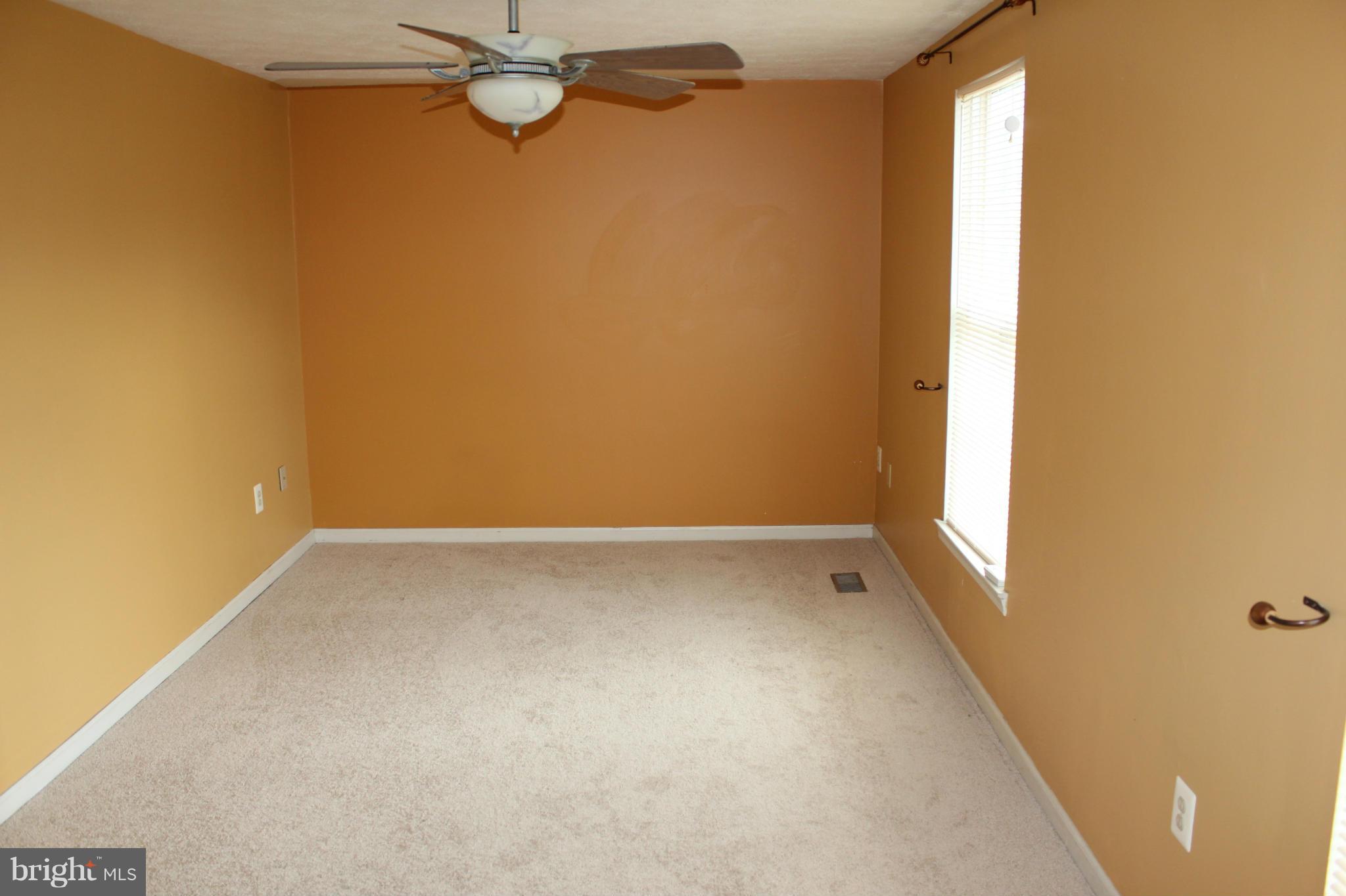 7791 Paddock Way Baltimore, MD 21244 - Photo 11 of 19 a view of an empty room with a window
