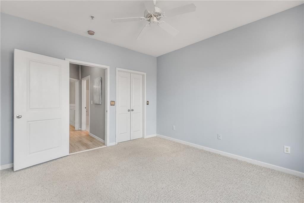 821 Ralph McGill Boulevard Northeast, Unit 3247 Atlanta, GA 30306 - Photo 24 of 43 wooden floor in an empty room