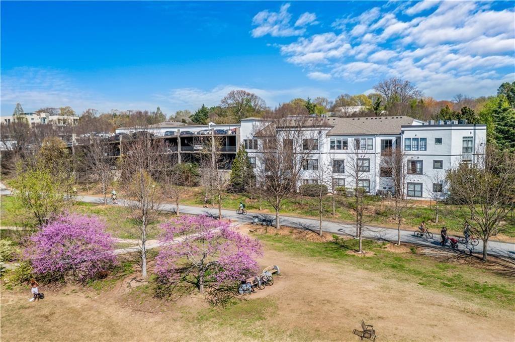 821 Ralph McGill Boulevard Northeast, Unit 3247 Atlanta, GA 30306 - Photo 30 of 43 a view of a lake with a building in the background