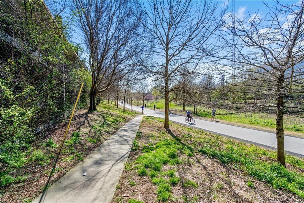 821 Ralph McGill Boulevard Northeast, Unit 3247 Atlanta, GA 30306 - Photo 31 of 43 a view of a yard with large trees
