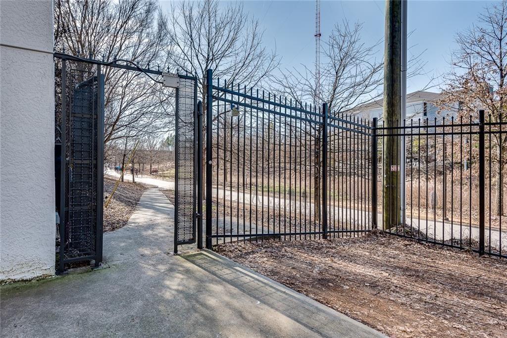 821 Ralph McGill Boulevard Northeast, Unit 3247 Atlanta, GA 30306 - Photo 39 of 43 a view of a backyard with large trees