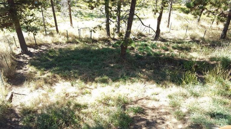 55837 Snow Goose Road Bend, OR 97707 - Photo 21 of 24 Back of the property, looking off deck