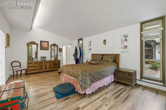 a white bath tub sitting next to a bathroom