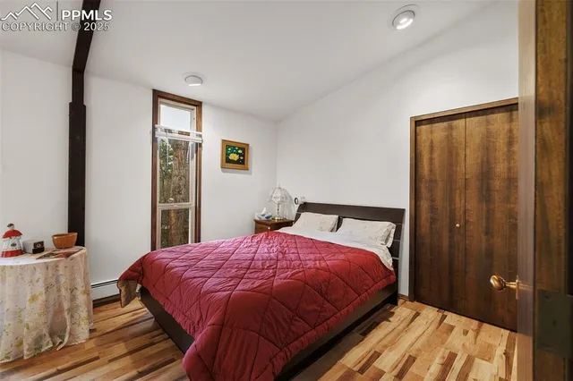 a bathroom with double sink and two mirror
