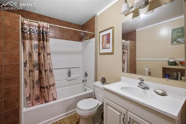 a bathroom with a toilet and a sink