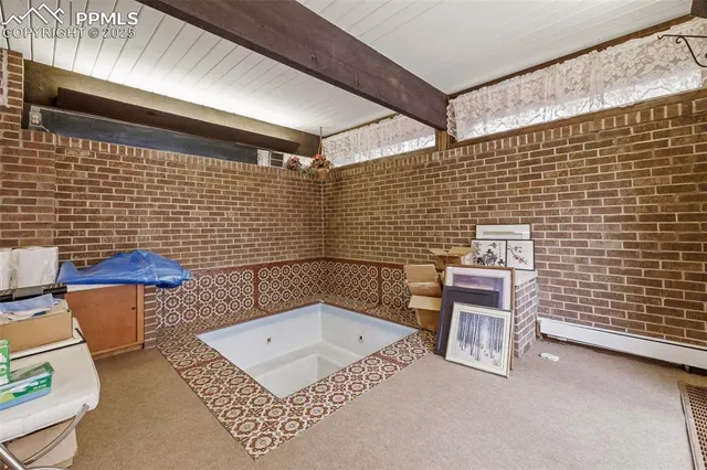 a view of a lounge chairs in the patio