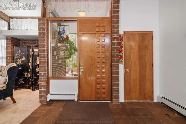 a living room with furniture and a rug