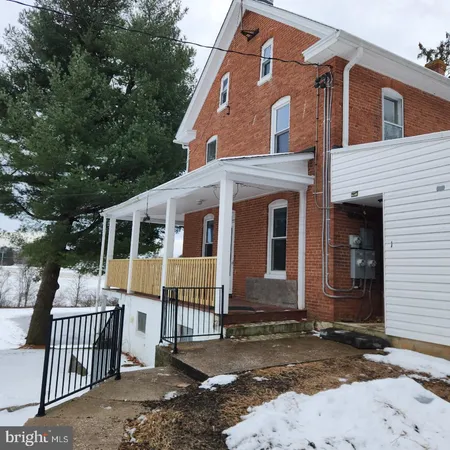 a front view of a house with balcony