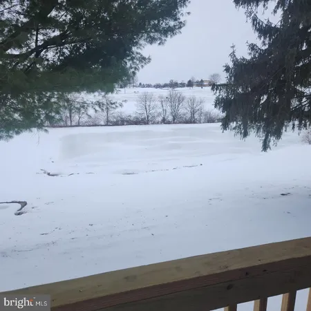 a view of yard and mountain