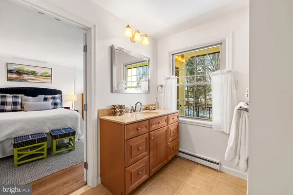 a view of a chair and table in a balcony
