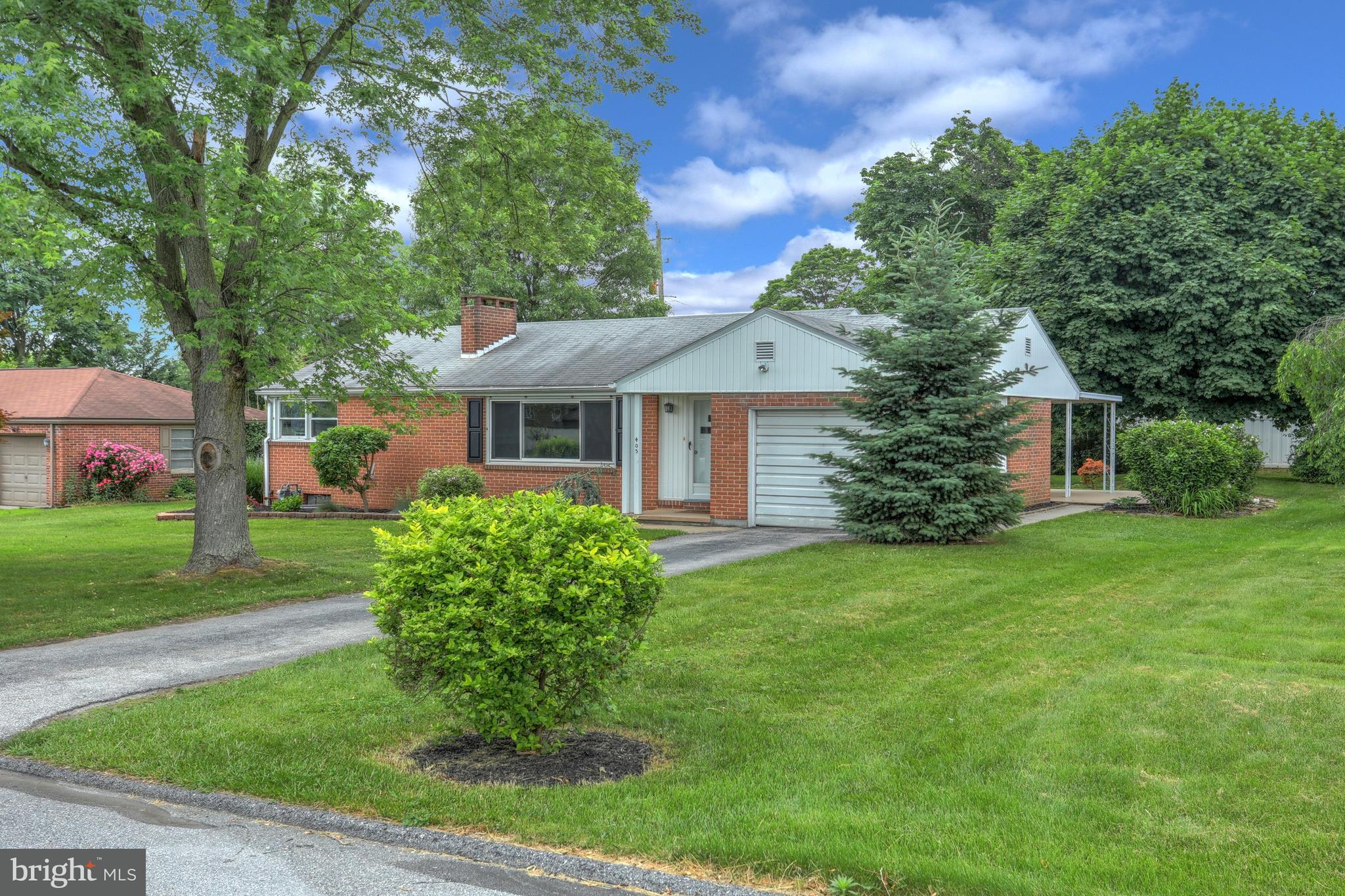 405 Edgehill Road York, PA 17403 - Photo 1 of 30 a front view of a house with garden
