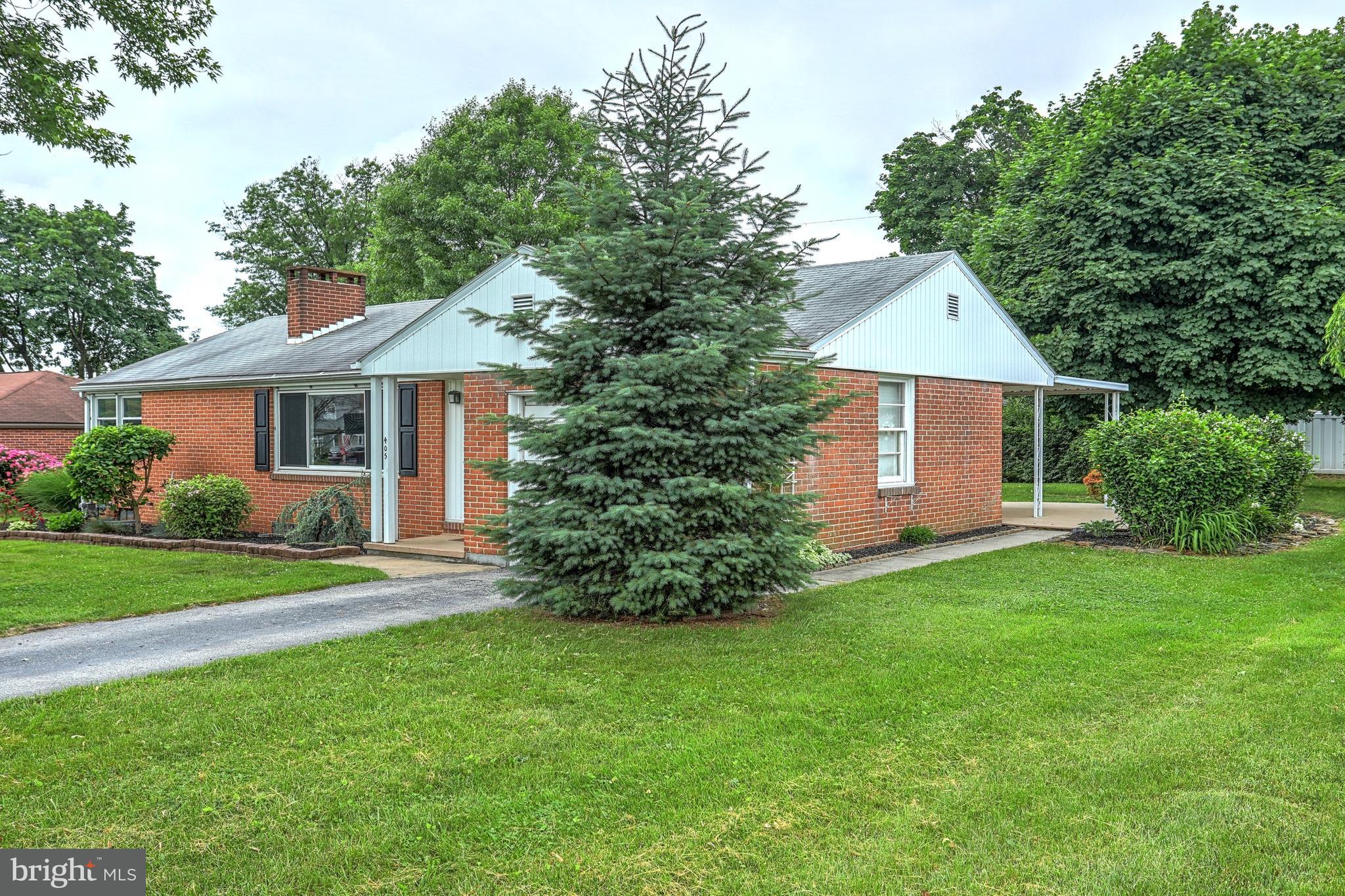 405 Edgehill Road York, PA 17403 - Photo 3 of 30 a front view of a house with a garden