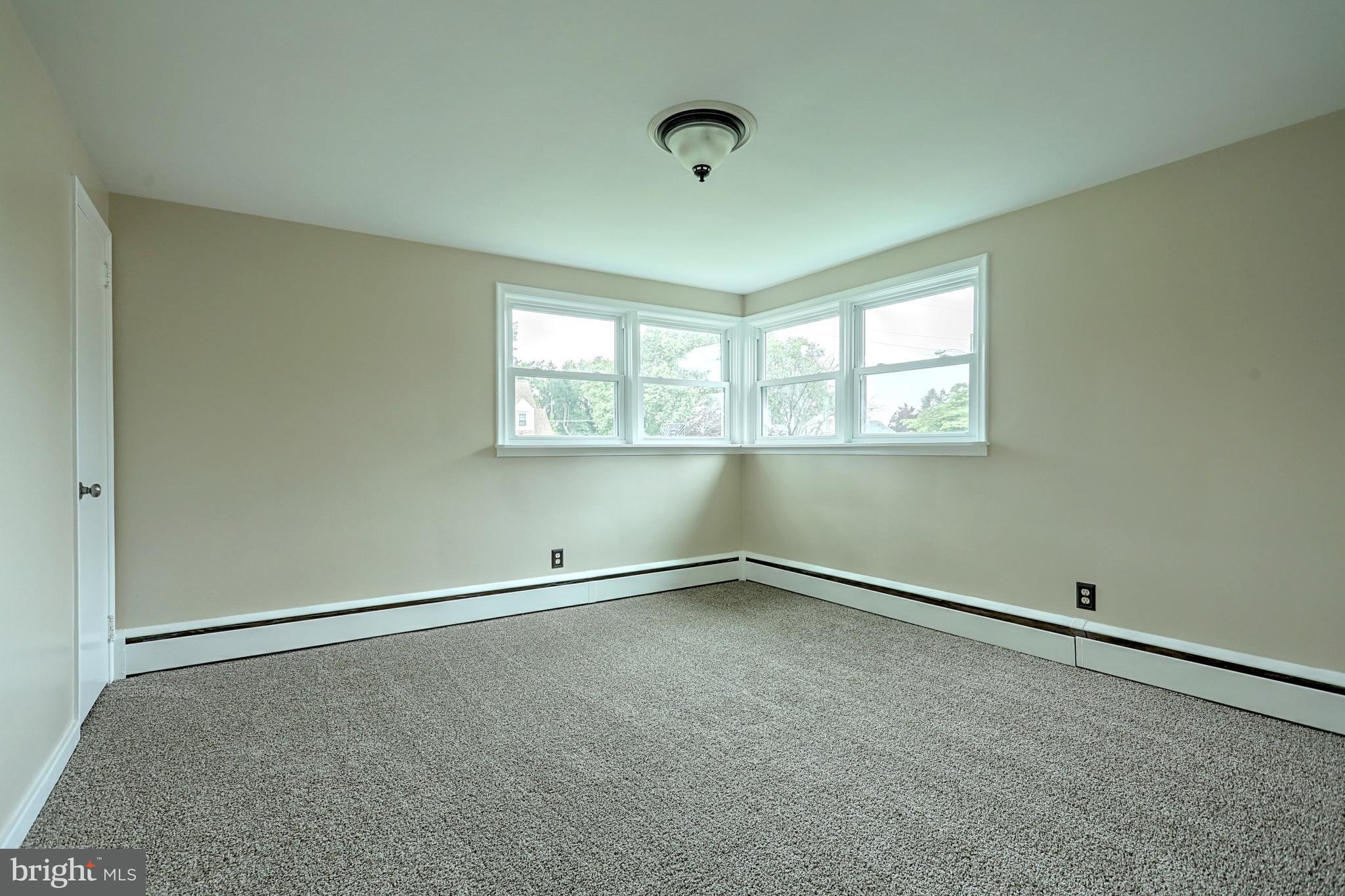 405 Edgehill Road York, PA 17403 - Photo 21 of 30 an empty room with a empty space and windows