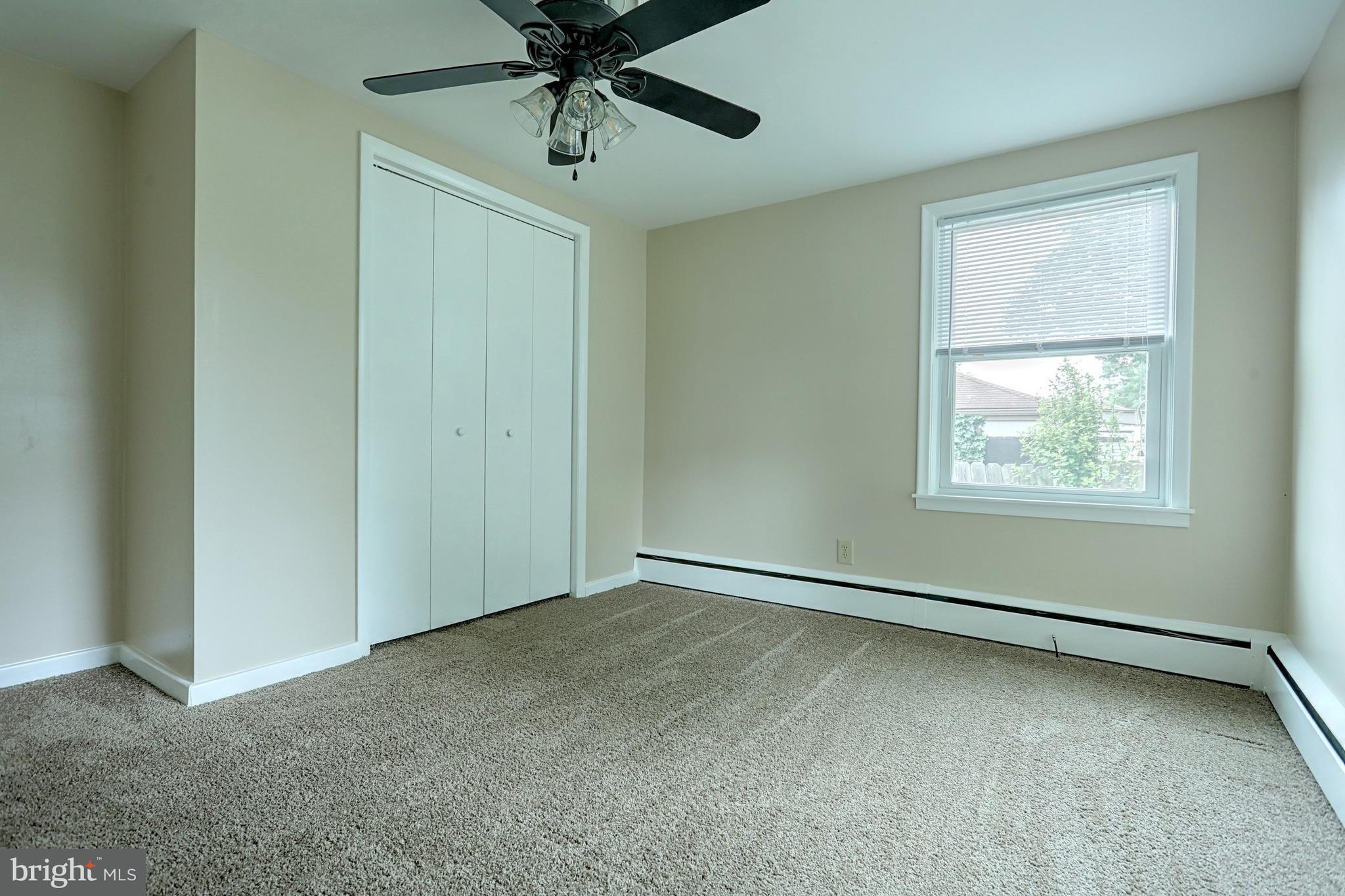 405 Edgehill Road York, PA 17403 - Photo 23 of 30 an empty room with a window and a fan