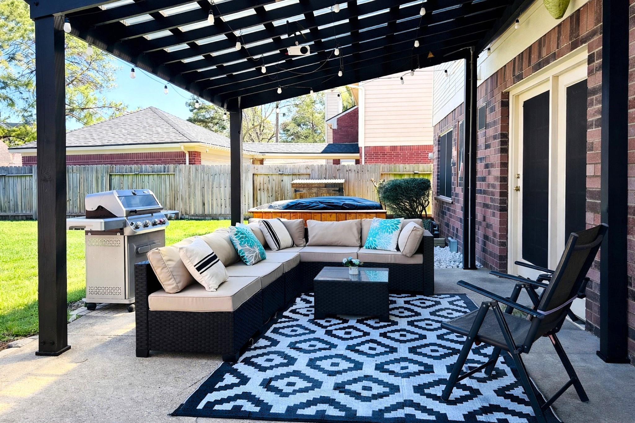 16910 Country Bridge Road Houston, TX 77095 - Photo 2 of 25 The backyard offers a stylish outdoor retreat complete with a pergola, ambient LED lighting, and an outdoor projector included with the lease—creating the perfect setting for evening gatherings and movie nights