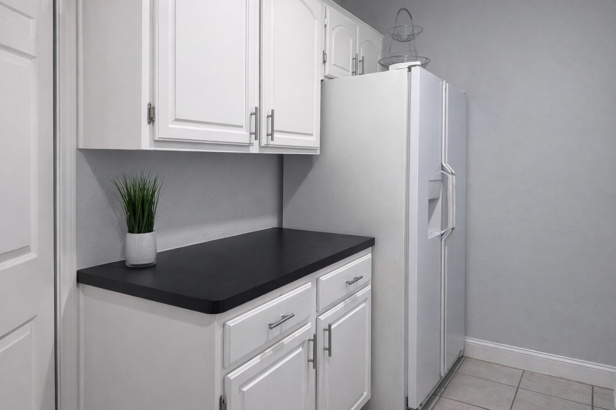16910 Country Bridge Road Houston, TX 77095 - Photo 21 of 25 Laundry room with extra cabinets and fridge