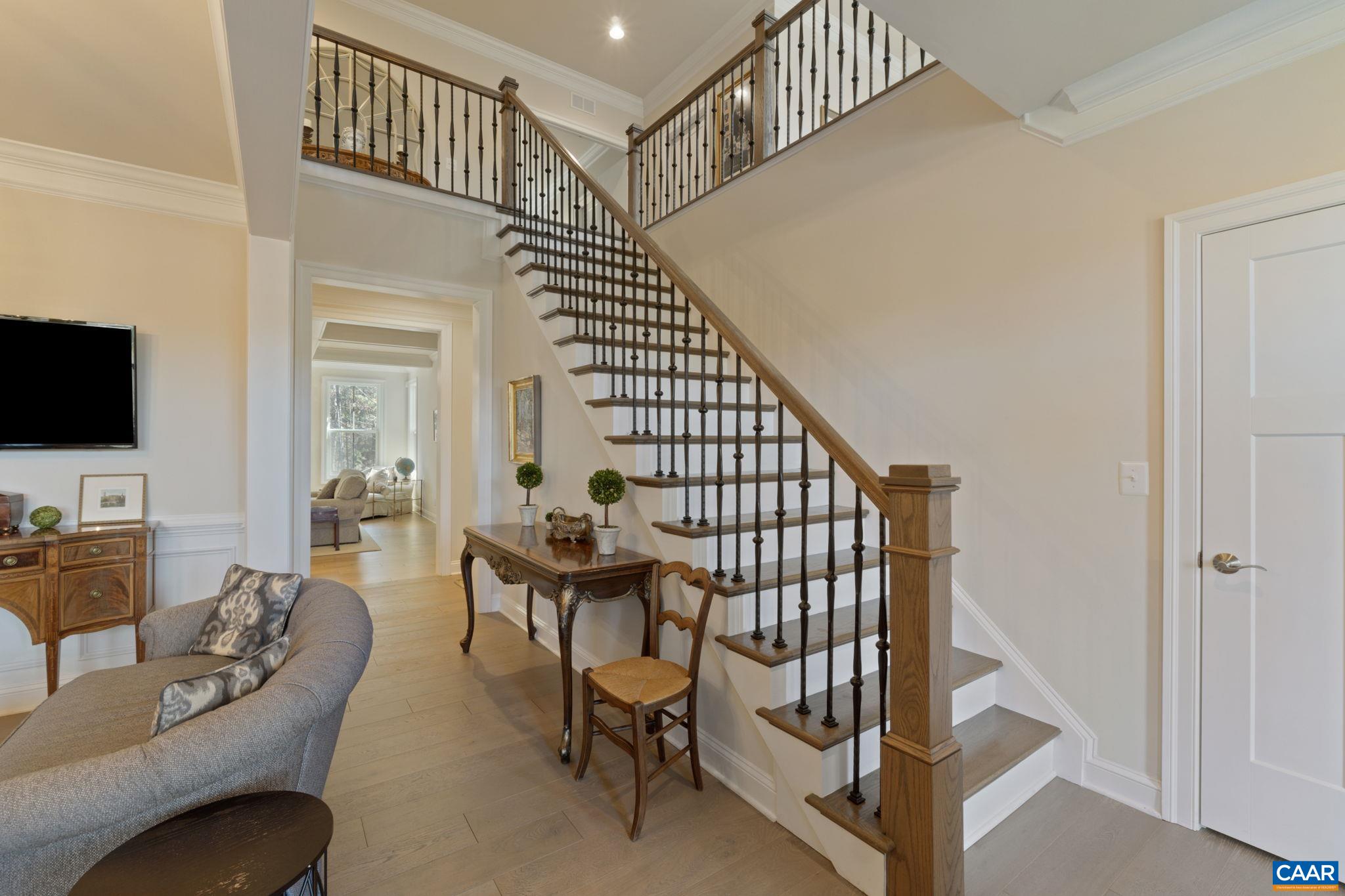 3650 Newbridge Road Keswick, VA 22947 - Photo 13 of 58 a view of entryway livingroom and hall with wooden floor