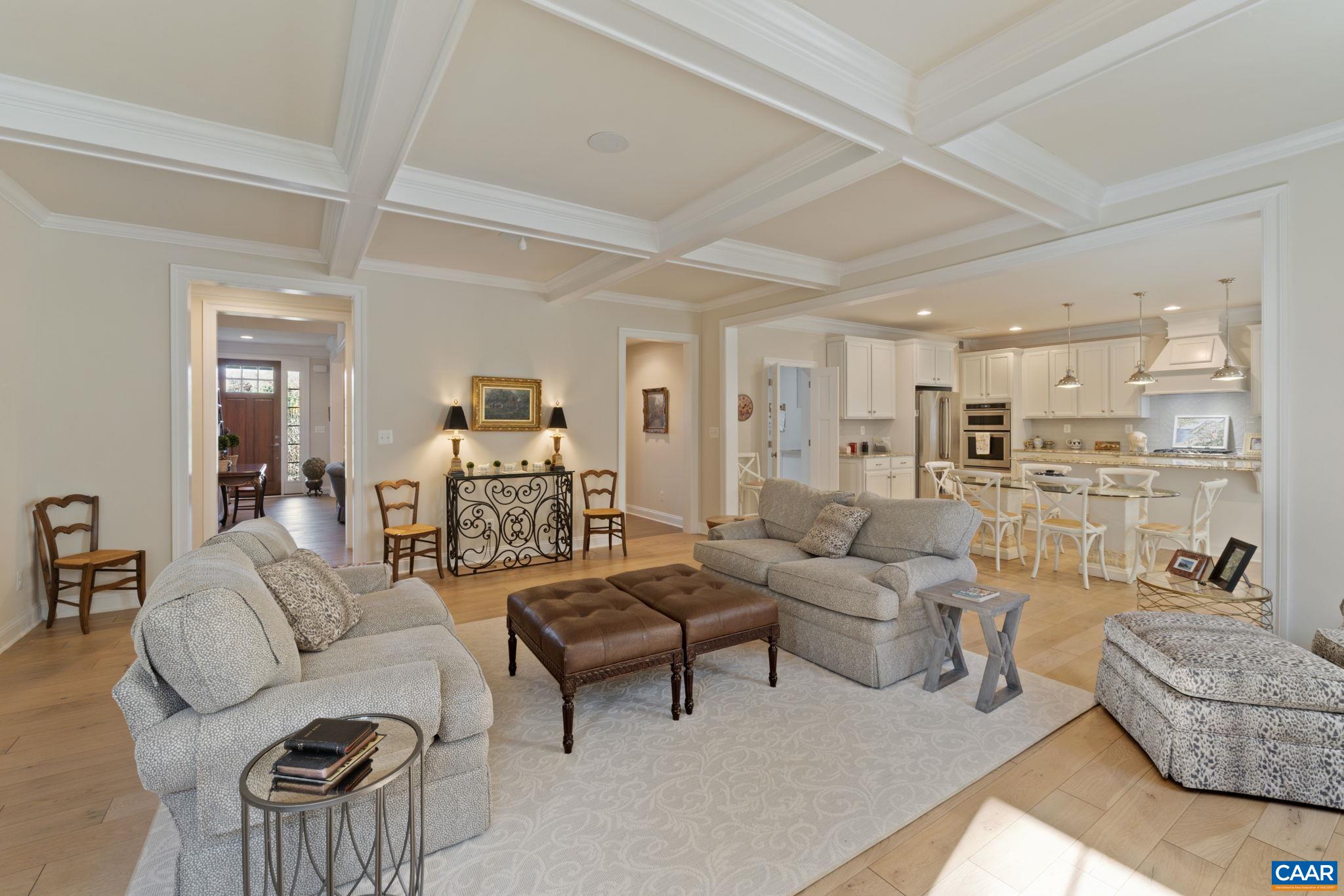 3650 Newbridge Road Keswick, VA 22947 - Photo 19 of 58 a living room with furniture and a view of kitchen