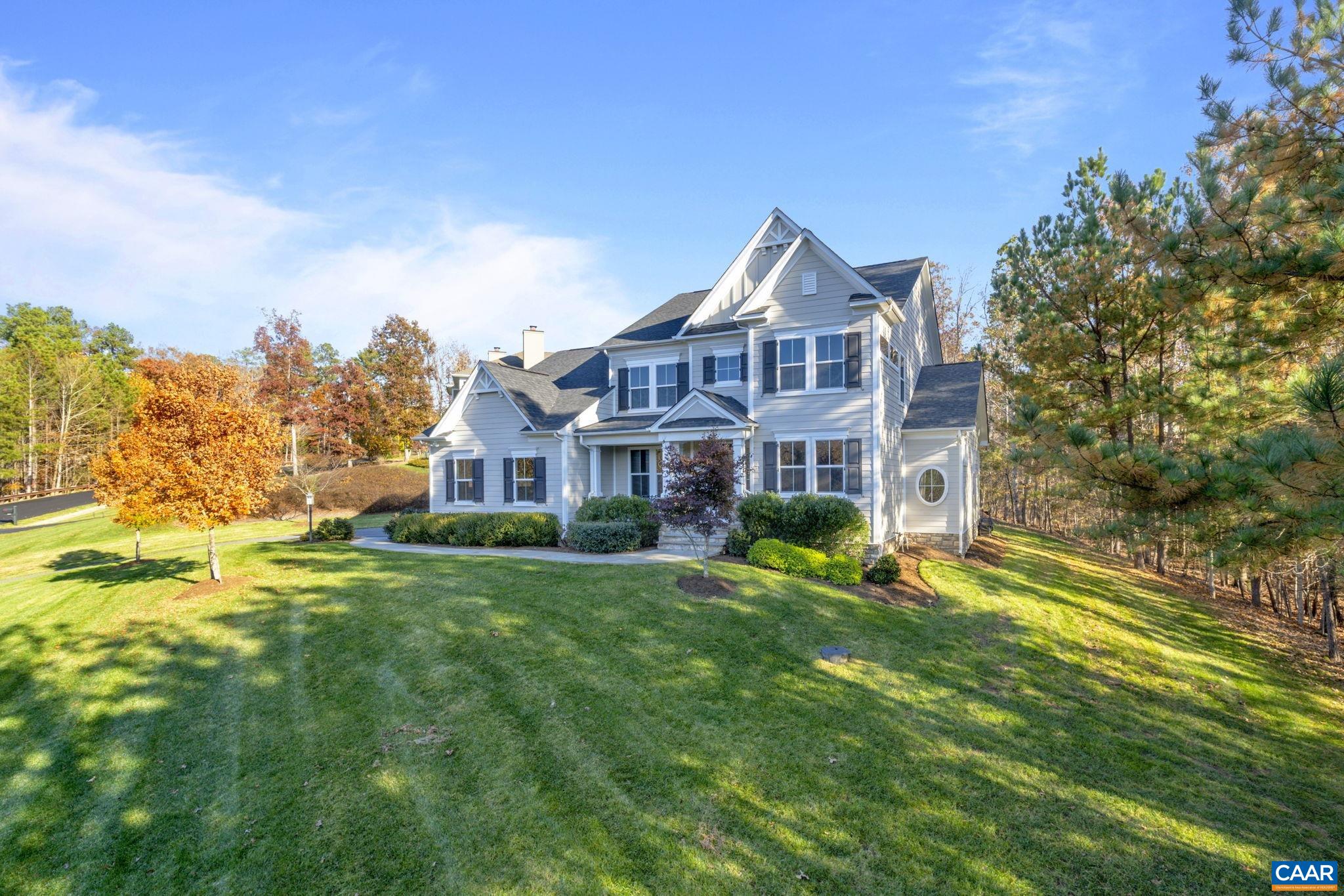 3650 Newbridge Road Keswick, VA 22947 - Photo 2 of 58 a front view of a house with a yard