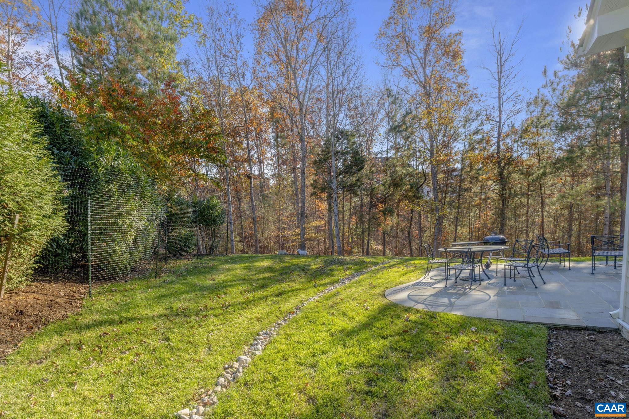 3650 Newbridge Road Keswick, VA 22947 - Photo 8 of 58 a view of a table and chairs in the patio