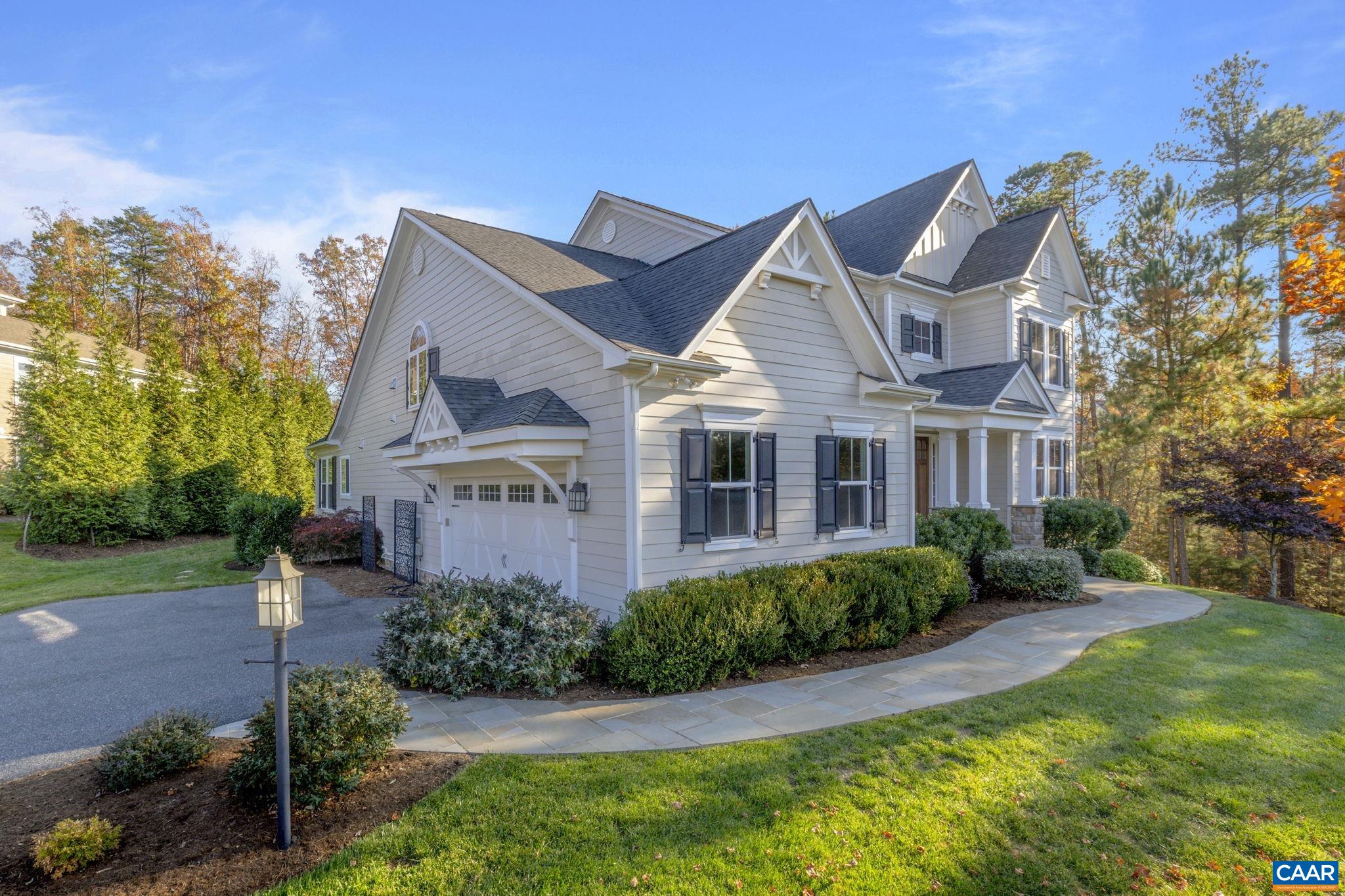 3650 Newbridge Road Keswick, VA 22947 - Photo 10 of 58 a front view of a house with garden