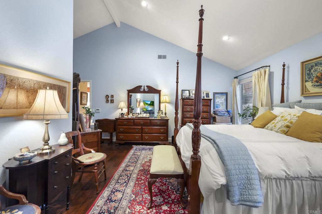 4683 Majorca Way Oceanside, CA 92056 - Photo 26 of 55 a bed room with a bed window and dresser