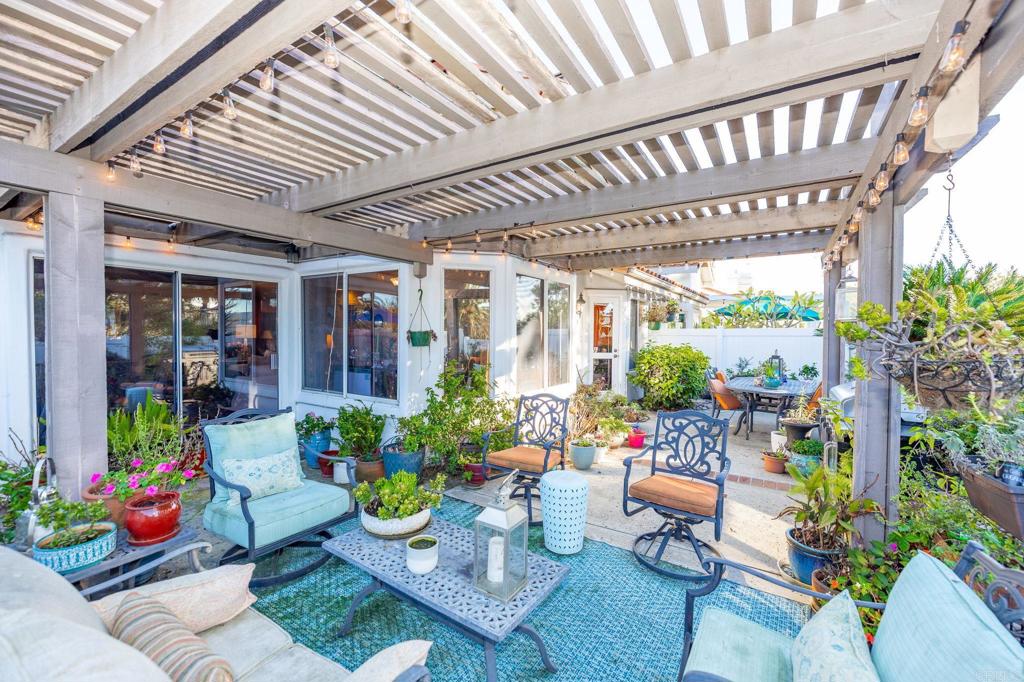 4683 Majorca Way Oceanside, CA 92056 - Photo 37 of 55 a outdoor living space with furniture and garden view