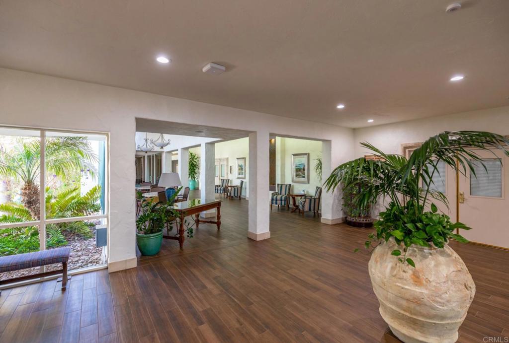 4683 Majorca Way Oceanside, CA 92056 - Photo 50 of 55 a living room with furniture and a potted plant