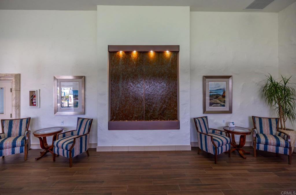 4683 Majorca Way Oceanside, CA 92056 - Photo 51 of 55 a view of a dining room with furniture and chandelier
