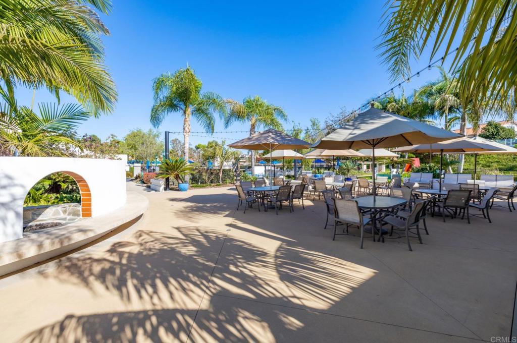 4683 Majorca Way Oceanside, CA 92056 - Photo 52 of 55 a swimming pool with outdoor seating and a tub