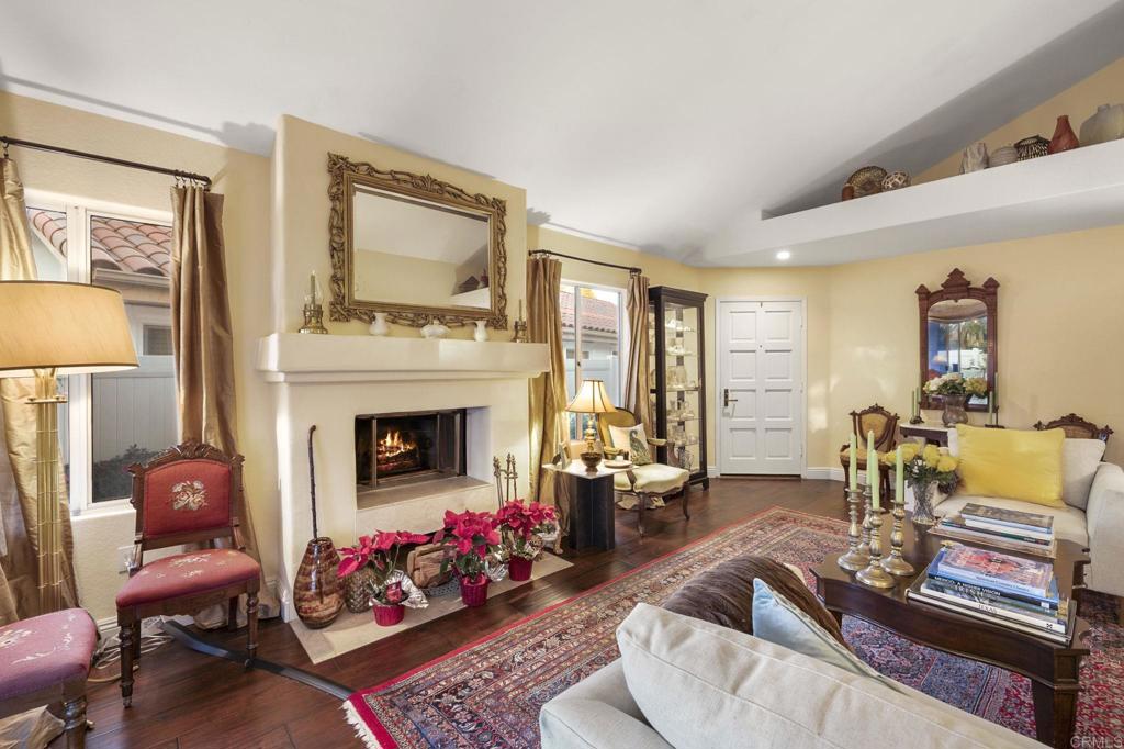 4683 Majorca Way Oceanside, CA 92056 - Photo 9 of 55 a living room with furniture and a fireplace
