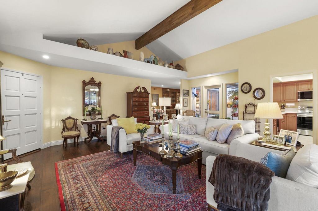4683 Majorca Way Oceanside, CA 92056 - Photo 10 of 55 a living room with furniture and wooden floor