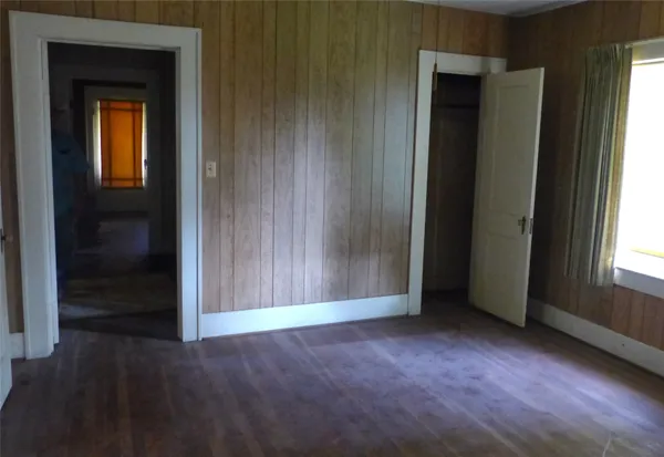 an empty room that has a window