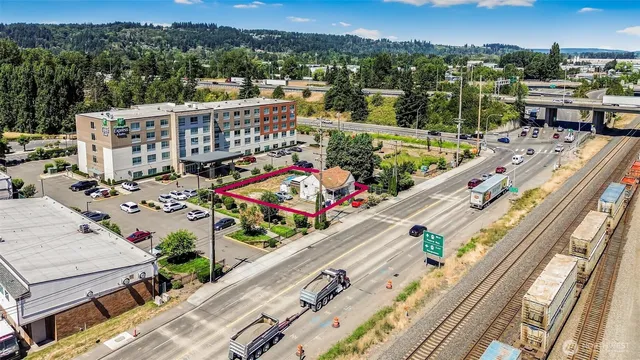 a view of multiple houses with a street