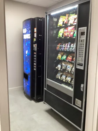a view of a patio with a table and chairs