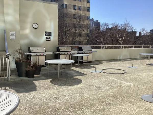 a view of a swimming pool with a lounge chairs