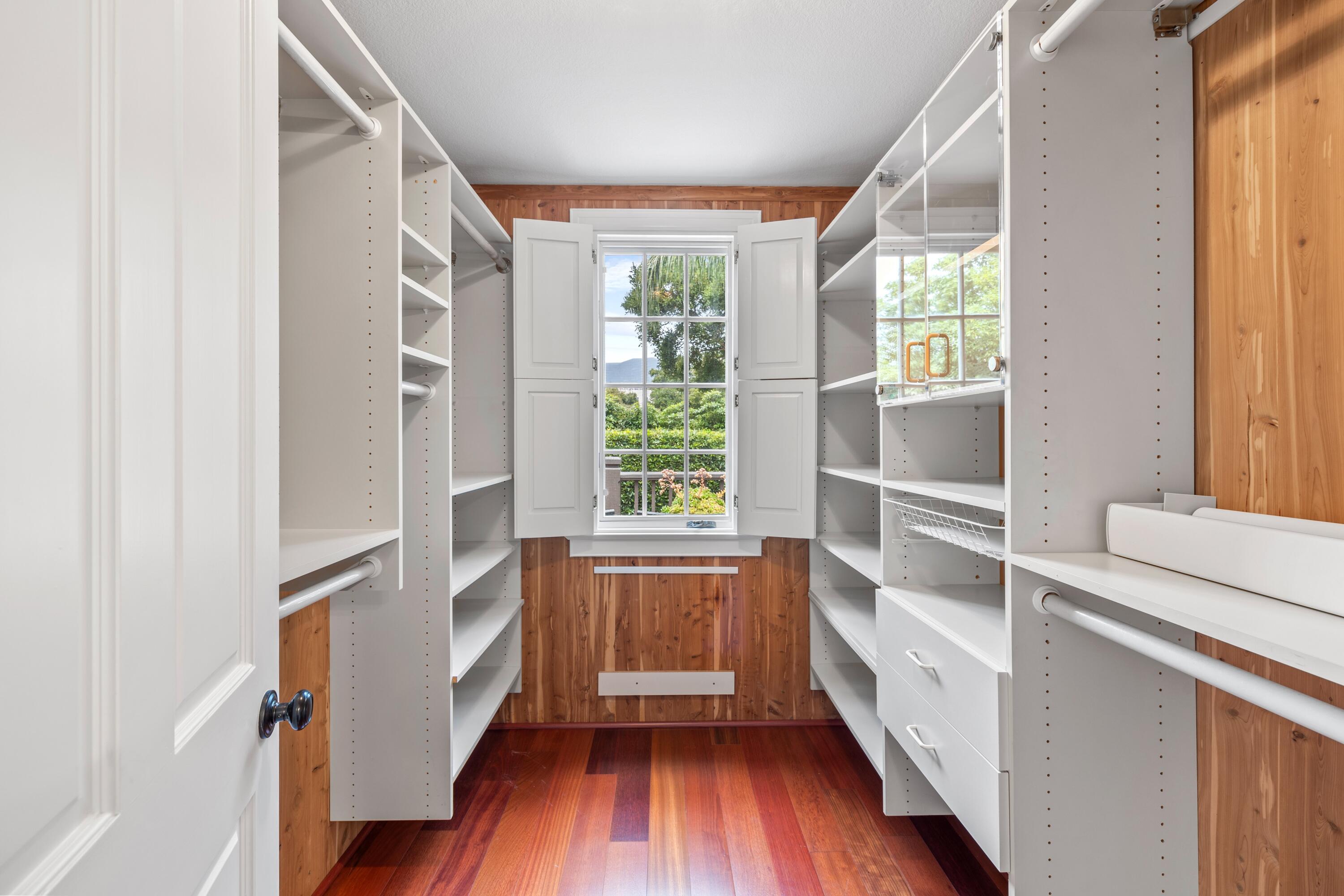 1284 Spring Road Santa Barbara, CA 93108 - Photo 12 of 33 a view of hallway with a large window and wooden floor
