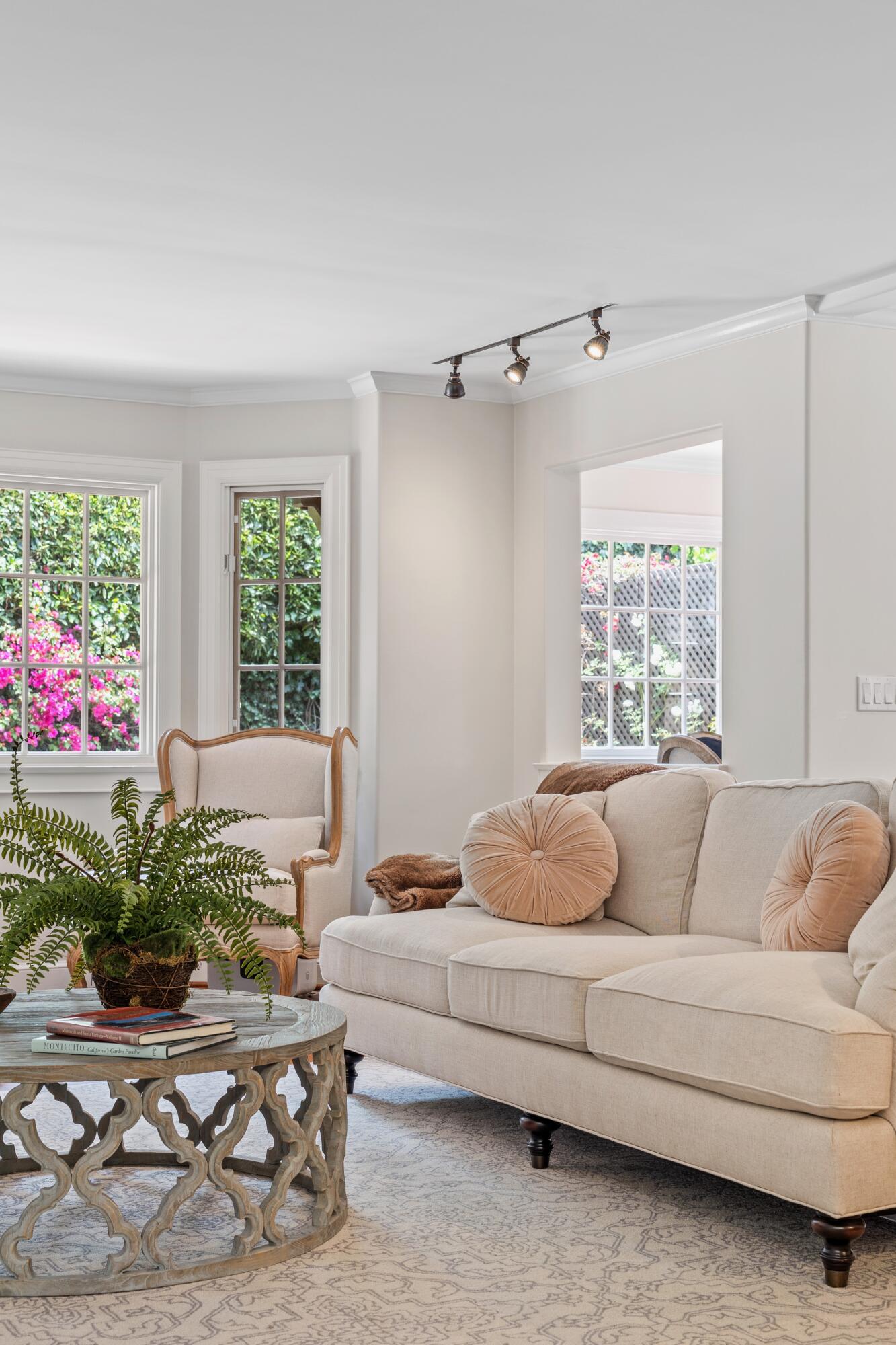 1284 Spring Road Santa Barbara, CA 93108 - Photo 4 of 33 a living room with furniture and a potted plant